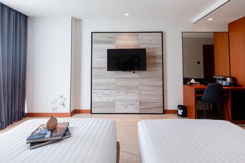 Μια τηλεόραση ή/και κέντρο ψυχαγωγίας στο Frame Hotel Bangkok