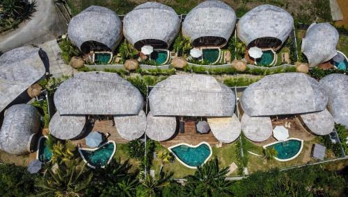 an overhead view of a group of elephants at a resort at Luxury Bamboo Villa near Beach in Canggu