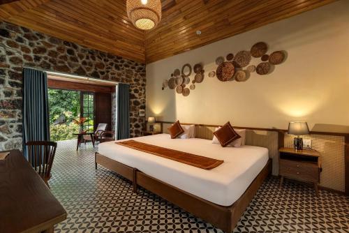 Voodi või voodid majutusasutuse Nature Garden Ecolodge Ninh Bình toas