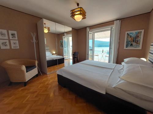 Ένα ή περισσότερα κρεβάτια σε δωμάτιο στο Apartman Solis 1