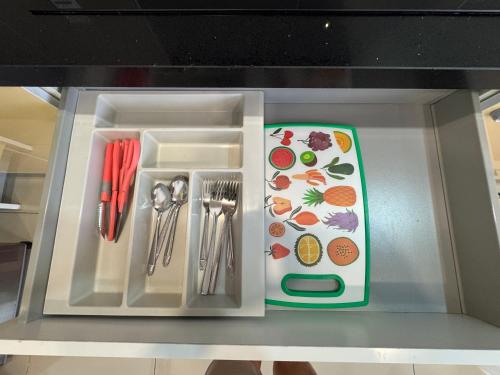a drawer in a kitchen with utensils in it at D'Pristine Medini, Iskandar Puteri Johor Bahru Walk to Legoland & Gleneagles in Iskandar Puteri