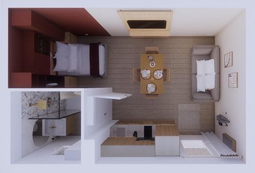 - un modèle de chambre avec un lit et des horloges dans l'établissement Limiria Studio, à Santa-Maria-Poggio