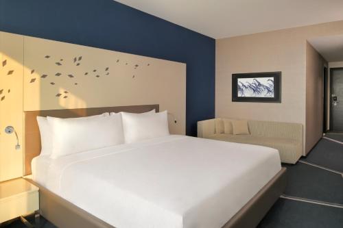 Ein Bett oder Betten in einem Zimmer der Unterkunft InterContinental Luanda Miramar by IHG