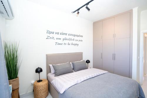 En eller flere senge i et værelse på FeWo Traum auf Rhodos