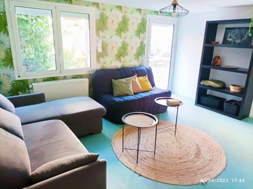 Posezení v ubytování La cahute, Gîte avec jardin pour 15 personnes