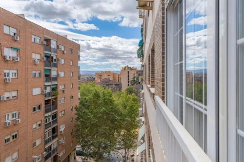 a view from the balcony of a building at Luxury suite Reino de Granada in Granada