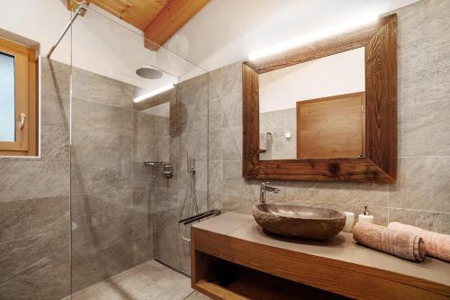 Koupelna v ubytování Chalet Resort Innerluferhof