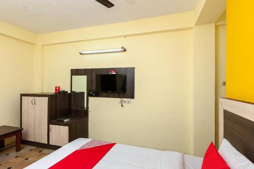 Una cama o camas en una habitación de מלון ארתור על החוף