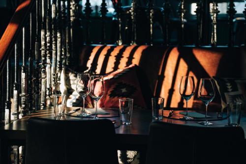 a table with wine glasses on top of it at Clarion Hotel Wisby in Visby