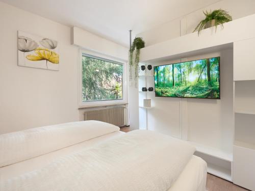 Ένα ή περισσότερα κρεβάτια σε δωμάτιο στο Central Palm Studio with free Parking