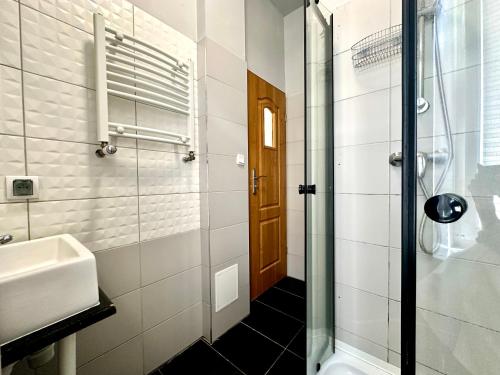 Koupelna v ubytování NW Pokoje na parterze CENTRUM & PARKING