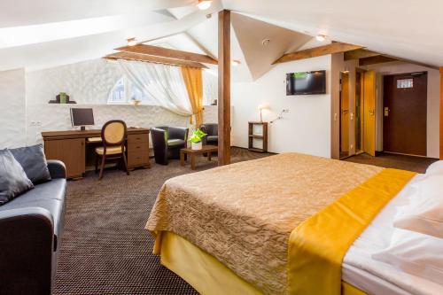 Voodi või voodid majutusasutuse The von Stackelberg Hotel Tallinn toas