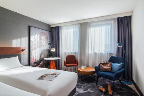 Кровать или кровати в номере Mercure Amsterdam City Hotel