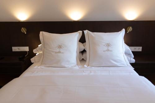 Postel nebo postele na pokoji v ubytování P SANTA CLARA HOTEL BOUTIQUE By Sojo
