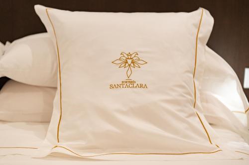 Postel nebo postele na pokoji v ubytování P SANTA CLARA HOTEL BOUTIQUE By Sojo