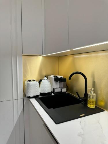 Køkken eller tekøkken på Apartament 606 - PORTA MARE - z widokiem na morze