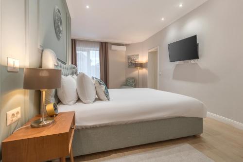 Ένα ή περισσότερα κρεβάτια σε δωμάτιο στο Dozsa Residence