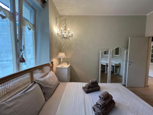 Ένα ή περισσότερα κρεβάτια σε δωμάτιο στο Chic Nest @GalleriaCavour