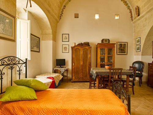 Una cama o camas en una habitación de Sax Barisano