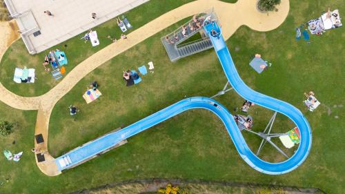 an aerial view of a water park with a slide at Kompas Camping Nieuwpoort in Nieuwpoort