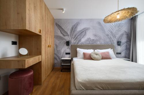 Ένα ή περισσότερα κρεβάτια σε δωμάτιο στο Exclusive Rooms Porto