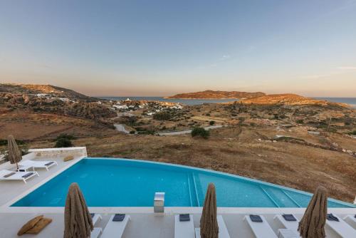 a swimming pool with a view of the ocean at ANEMOLETHE in Kimolos