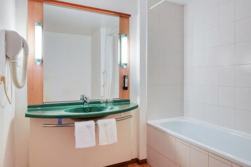 Koupelna v ubytování B&B HOTEL Mons Gare