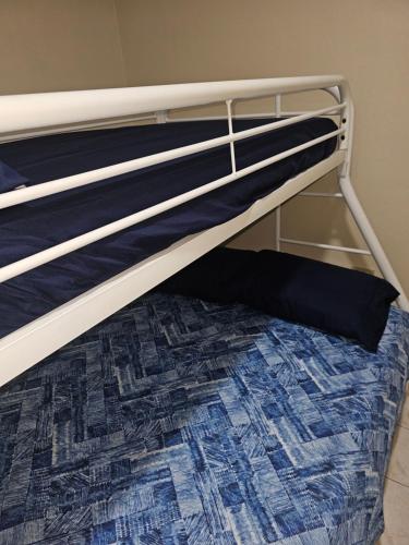 a bunk bed with a pillow on the bottom bunk at Casaplayuela in Camaceyes