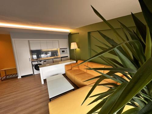 a living room with a couch and a table at OTTO Tunalı Houses in Ankara