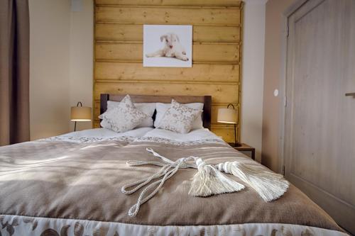 Katil atau katil-katil dalam bilik di Gordonówka Residence & SPA- sauna i jacuzzi-przeżyj niezapomniany pobyt