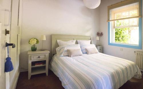 Giường trong phòng chung tại Casa con encanto