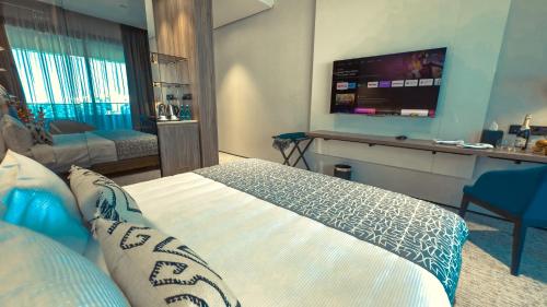 Voodi või voodid majutusasutuse Ebreaze Hotel toas