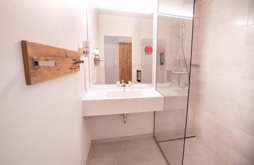 Koupelna v ubytování COOEE alpin Hotel Dachstein
