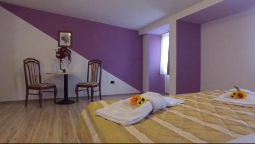 Katil atau katil-katil dalam bilik di The Two Hearts Hotel