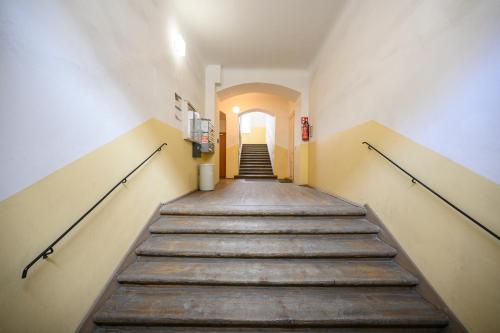 a long hallway with stairs in a building at Spacious apartment in Graz for 6 people in Graz