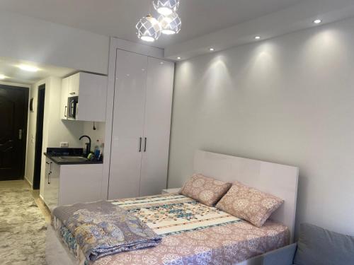 Ένα ή περισσότερα κρεβάτια σε δωμάτιο στο Luxury studio side sea view