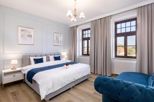 Ένα ή περισσότερα κρεβάτια σε δωμάτιο στο Sonata Apartments
