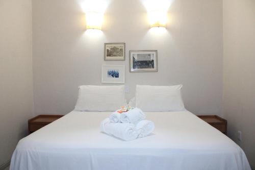 Ένα ή περισσότερα κρεβάτια σε δωμάτιο στο Portal Pantaneiro Hotel