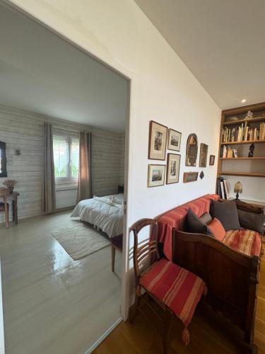 Postel nebo postele na pokoji v ubytování la vue des étangs