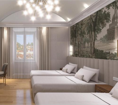 En eller flere senge i et værelse på Lumi Hotel
