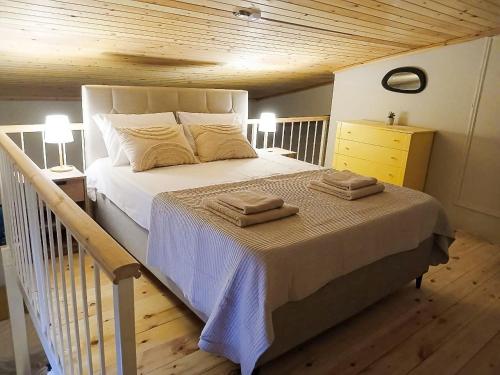 Postel nebo postele na pokoji v ubytování Avdira Dreamin'