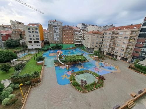 an aerial view of a water park in a city at Hogar de Dulce in Vigo