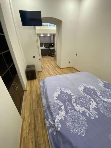 Postel nebo postele na pokoji v ubytování SUPER LOCATION Low-cost flat