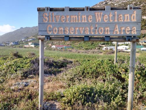 a sign for silverine victoria vegetation conservation area at Place of Grace in Cape Town