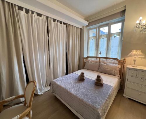 Ένα ή περισσότερα κρεβάτια σε δωμάτιο στο Chic Nest @GalleriaCavour