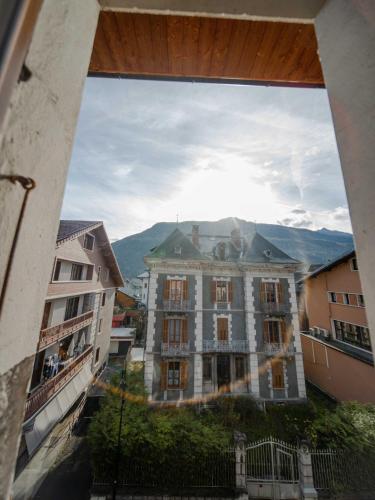 a view of a large building in a city at Appartement Lumineux Bourg Saint Maurice in Bourg-Saint-Maurice