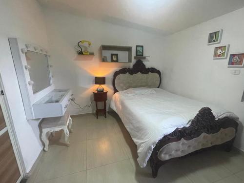Postel nebo postele na pokoji v ubytování Hostal los profes