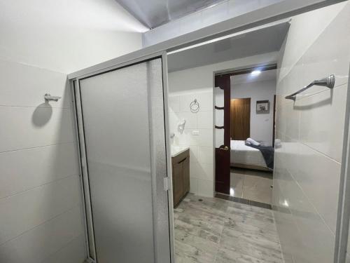 Postel nebo postele na pokoji v ubytování Hostal los profes