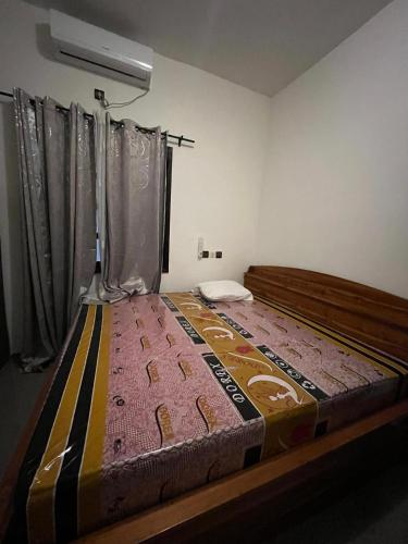 Llit o llits en una habitació de Cin Immobilier