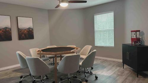 a dining room with a table and chairs at Retreat close to Lewisville Lake with pool, pet ok in Little Elm